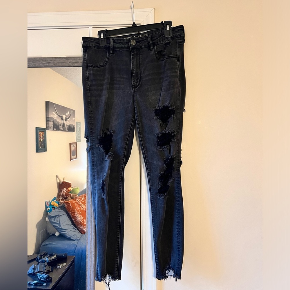 Distressed fringe ankle high waisted skinny jeans